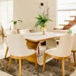 white wooden table with chairs